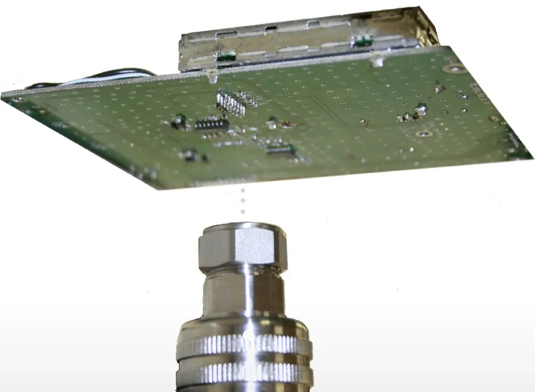 Flux Drop-Jet head dispensing flux onto a circuit board